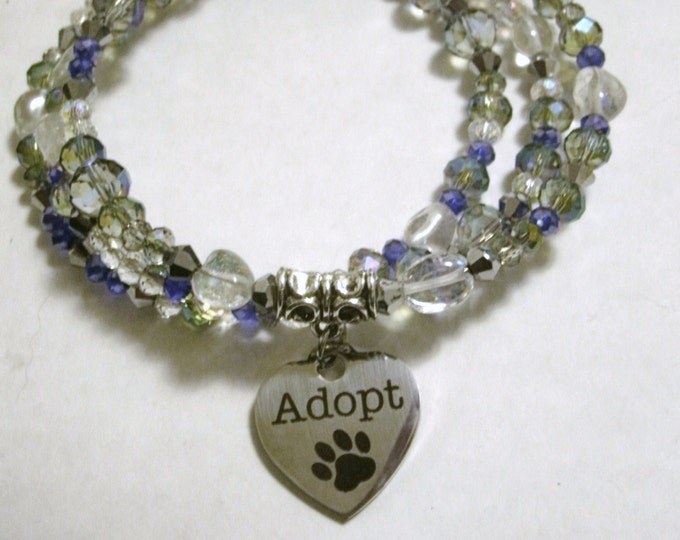 Adopt Paw Print Crystal and Quartz Beaded Memory Wire Bracelet with cat and or dog charms, you choose where they are hung, animal lover