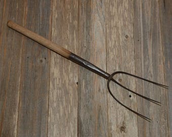 HAY PITCH FORK; A Great Decorative, Vintage, Rusty Hay Pitch Fork With A shortened handle.