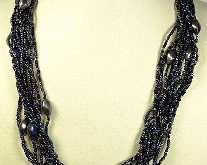 Storewide 25% Off SALE Beautiful multi-chain designer Zumani glass and seed beaded necklace designed with Bohemian flair