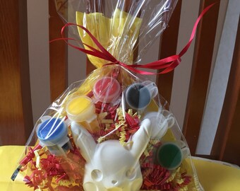 Pokemon inspired party favors. Picachu party favors . Made to paint .Comes with paint and brush in each bag ,Complete party favors