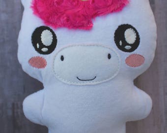 pink fluffy unicorn toy