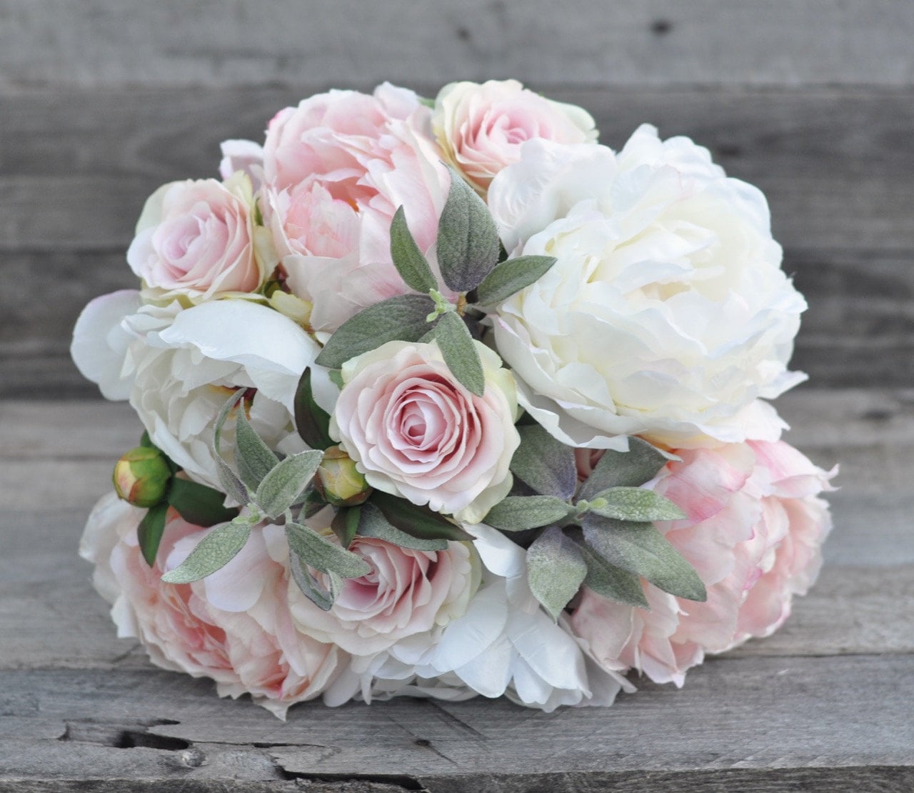 Soft pink wedding bouquet made with sage pink rose pink