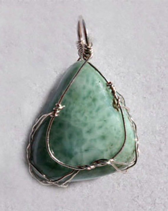 Larimar pendant wrapped Celtic style in sterling silver