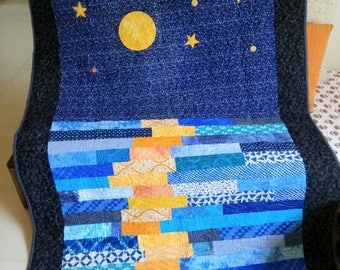 Modern Throw quilt. Sky quilt. Moon reflection quilt. Lap quilt. Homemade quilt. Ocean quilt. Blue Sky Quilt. Patchwork quilt. Quilt sale.