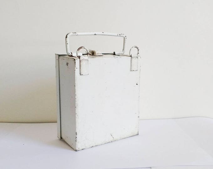 Small vintage first aid box, white and red metal travel box by the Safety Supply Company