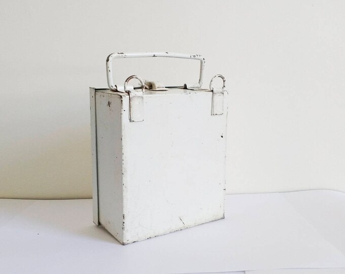 Small vintage first aid box, white and red metal travel box by the Safety Supply Company