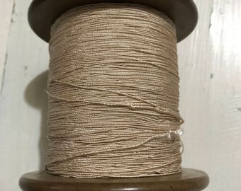 Vintage, Hard to Find Lestershire Everlastiing spool full of off white elastic thread