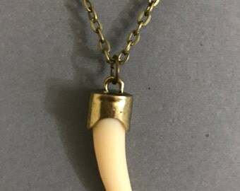 Saber Tooth Charm