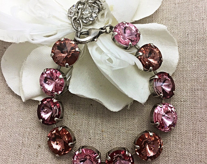 Pink Valentine's Statement bracelet adorned with 12mm rivoli Swarovski crystals in an ombre of pink that provide plenty of sparkle.