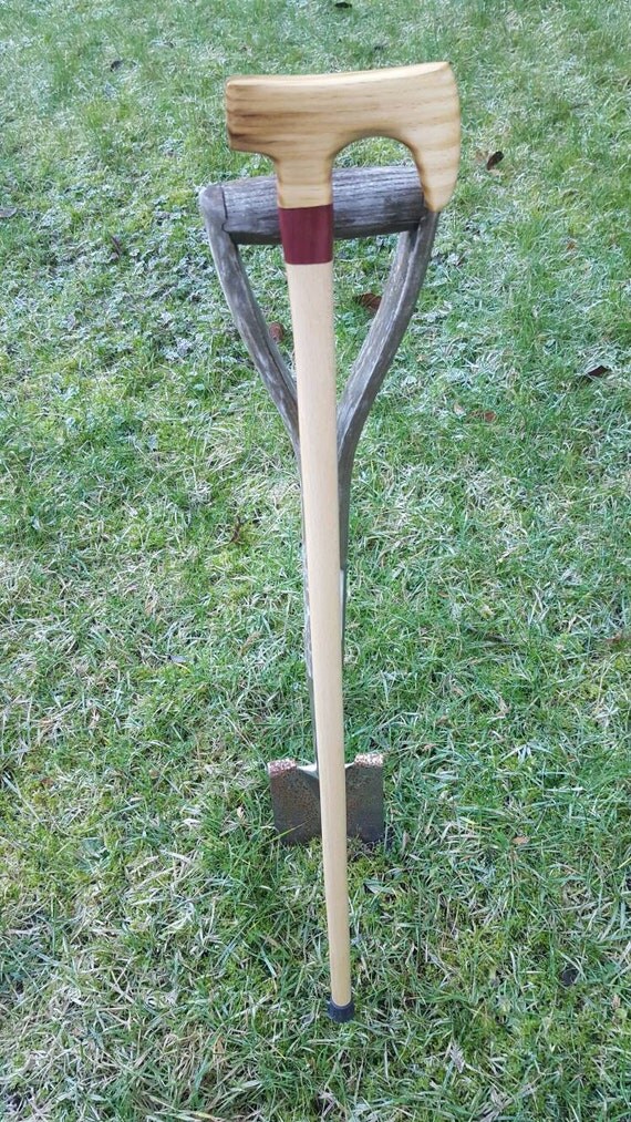 Axe head walking stick made from hard woods tried and tested