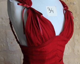 Corseted and draped dress
