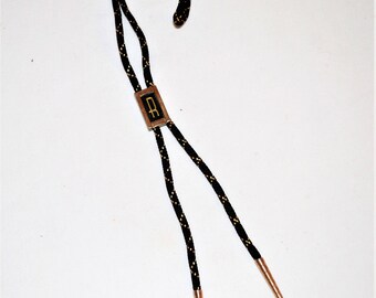 Vintage Bolo Rocking the R