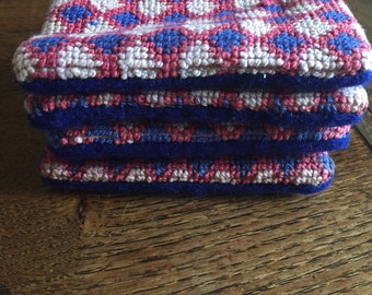 Set of four needle point coasters
