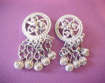 Pretty "Fashion in Motion" Dangling Earrings Signed: "Sarah Cov"