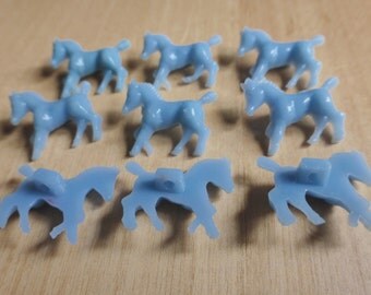 1950s horse buttons. Nine plastic light blue vintage buttons. In a very good vintage condition.