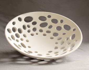 Shell fascinating filigree concrete shell; a wonderful result from the dialogue of organic and architectural design
