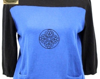 Royal blue and black cotton blend pull-over sweater with boat collar/ inset pockets/ embroidered with black mandala design on f
