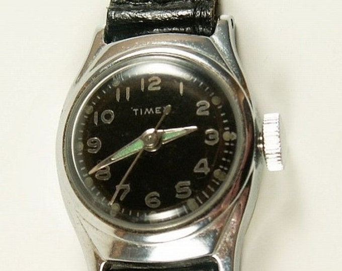Storewide 25% Off SALE Lovely Vintage TIMEX Mechanical Silver Tone Trimed Black Dial Watch Featring Original All Black Leather Band and Lumi