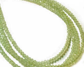 Prehnite 2.5mm micro-faceted rondelles. Select a strand length.