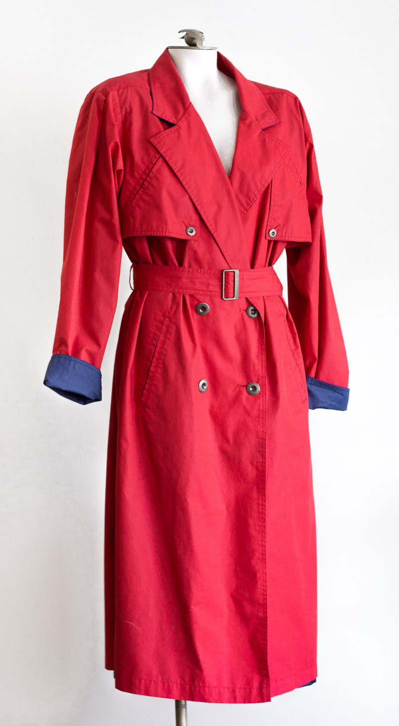 Red double breasted belted trench coat