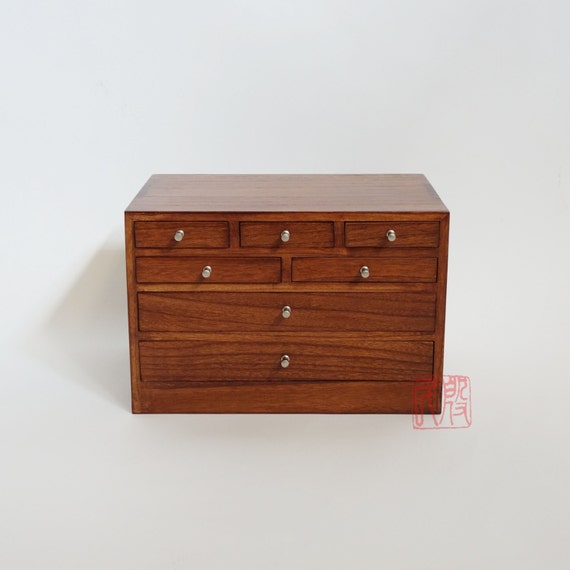 Japanese style jewelry box hand made with solid kiri wood.