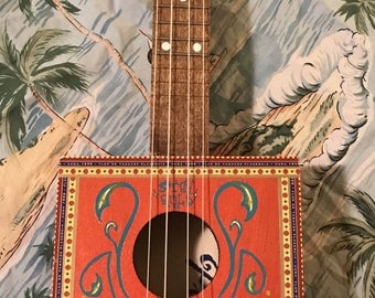Handmade cigar box ukulele with pinstriping