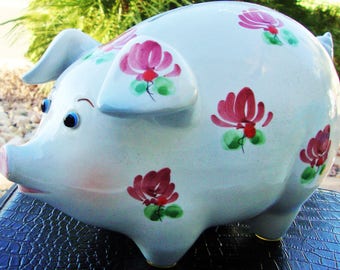 What types of antique ceramic pigs are available to buy?