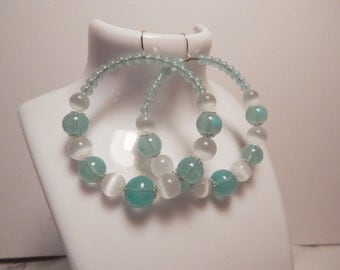 Hoop Earrings, with pale blue glass beads....