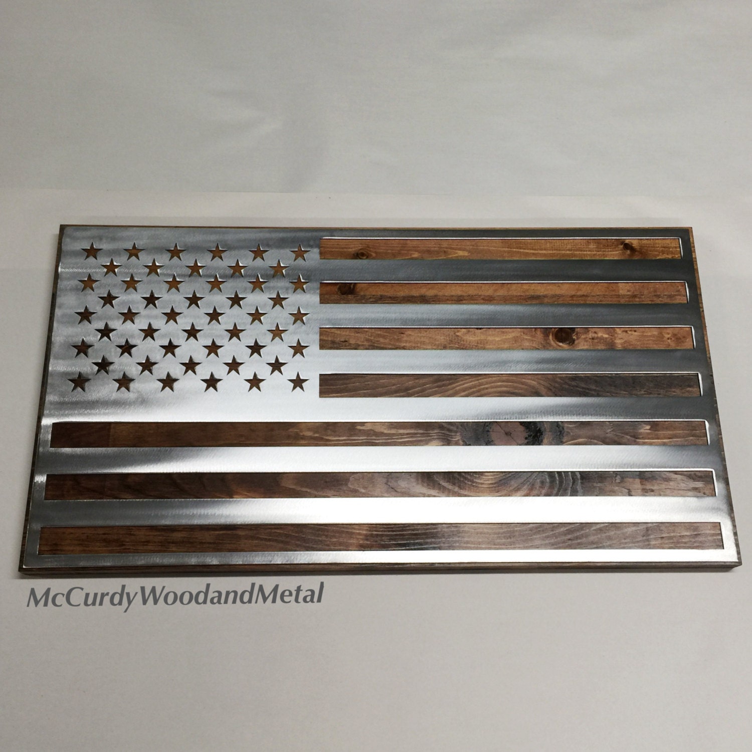 Metal American Flag mounted on wood