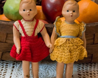 Vintage bisque frozen charlotte/ kewpie doll from 1930s.