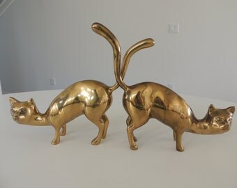 Pair of mid century brass cats boho bookends