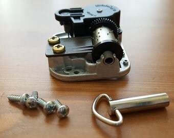 popular songs, musical movement, wind up music box, music box insert, music box supply, 18 note music box, musical box, mechanical music box