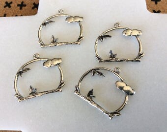 Antique silver tone bird stand charm pendants