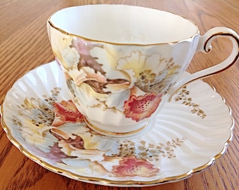 Aynsley swirl English bone china tea cup and saucer covered in orchids