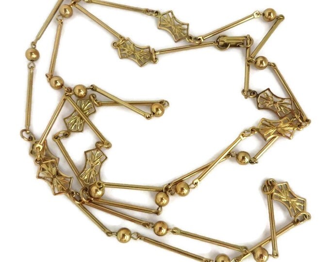Japan Goldtone Bows and Beads Long Necklace