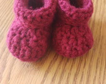 Baby booties, sizes newborn-9 month. Multiple color options.