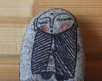 Jizo painted in stone.