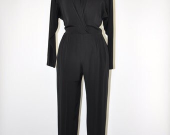 70s black wrap jumpsuit / 1970s rayon playsuit / black minimalist jumpsuit