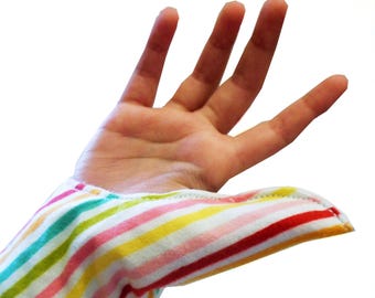Thumb glove. 'Active' thumb guard, thumb sucking glove,thumb guard,stop thumb sucking,help children remember not to suck thumb.
