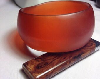 Orange vintage plastic bangle