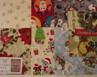 Xmas quilting fabric pre-cut into 14 x 6 1/2 inch squares