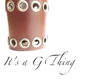 Wide Dark Brown Leather Cuff with decorative grommets