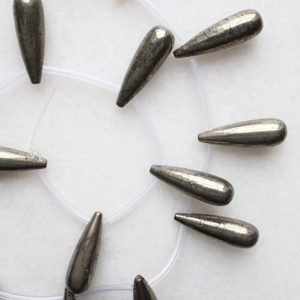 Pyrite Top Drilled Drop Beads 8x25mm 16" strand from LittleFacet on