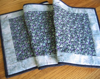 Last One - Quilted Table Runner in a Leaves and Small Purple Grapes on Black Pattern