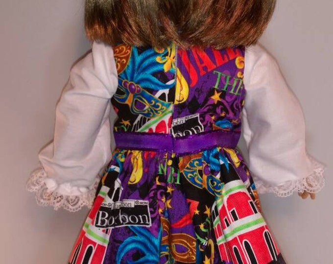 Black dress with new Orleans icons for Mardi Gras parade dress and blouse set fits 18 inch dolls like American girl,
