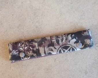 Supernatural inspired DPN knitting needle cozy
