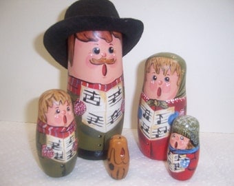 Hand painted Caroler Collection stacking nesting doll set