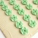 Small green buttons on a vintage button card, antique mint green buttons in flower shape, 1930s flower buttons, 14mm
