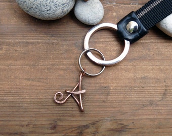 Personalized cursive letter keyrings. Copper letter keyrings.