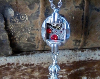 Steampunk necklace - Ruby - Steampunk watch parts - Repurposed Art